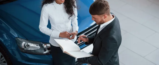 Smiling woman with car and salesman promoting cheapest car insurance deals