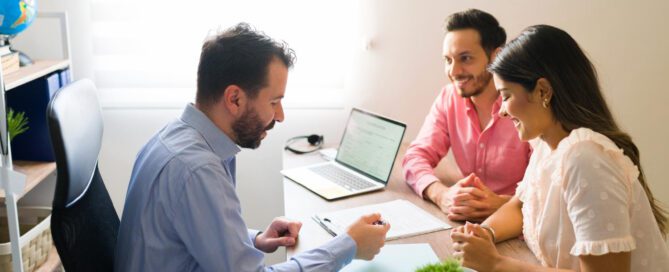 Young man reviewing plans from top business insurance companies in NC